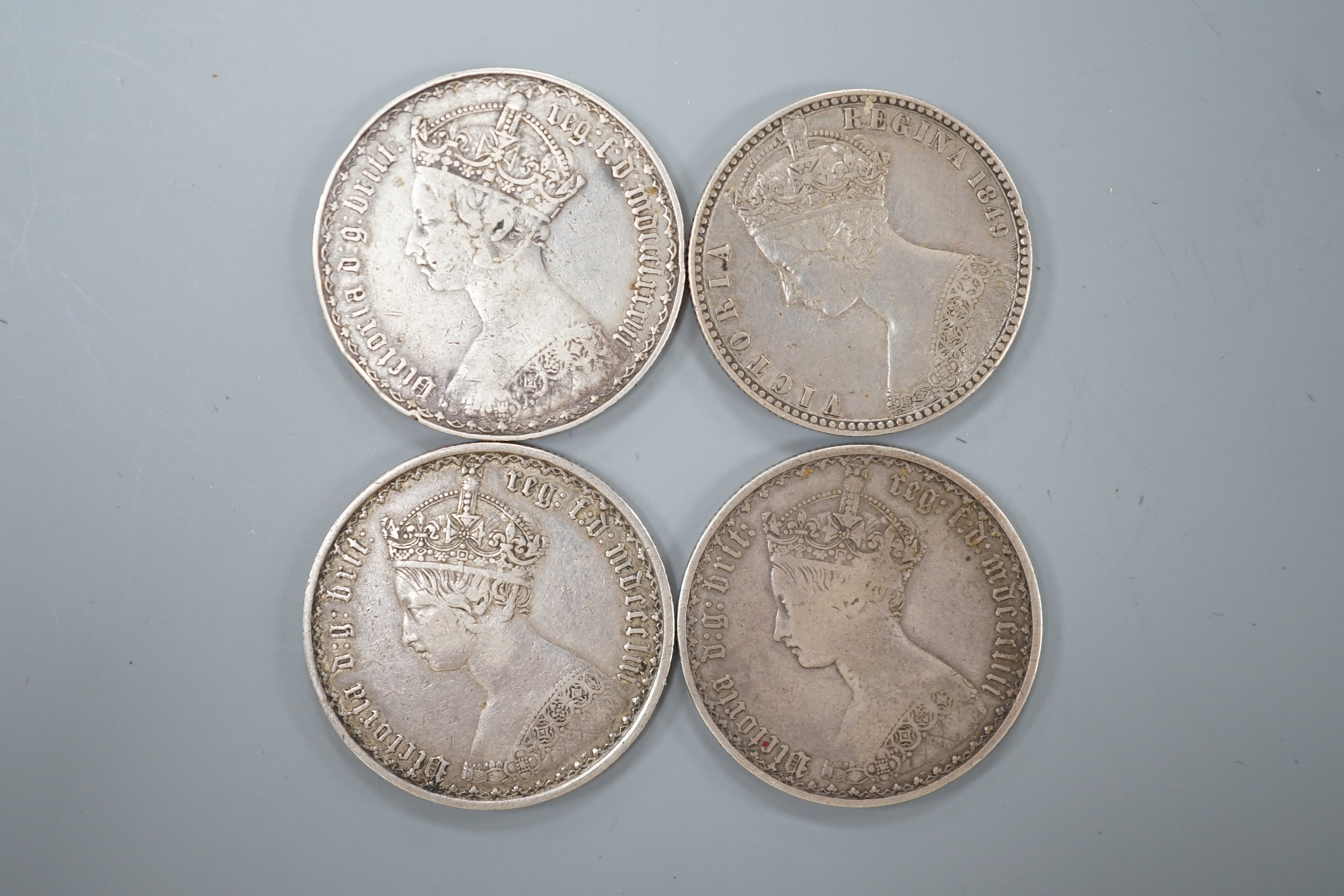 Four Victoria Gothic florins - ‘Godless’ 1849, VF, two 1883, both good F, 1853